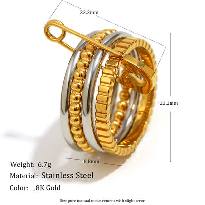 4-layer gold and silver ring with safety pin design, beaded and textured bands
