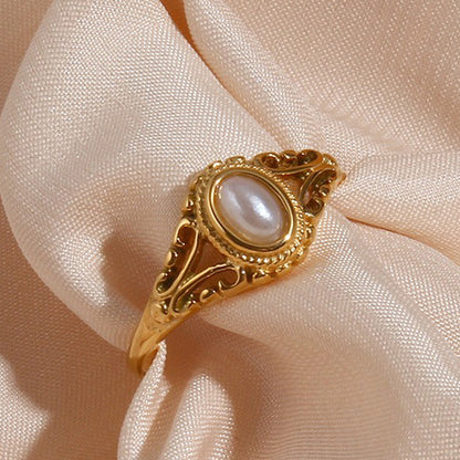Delicate, feminine, and timeless — this Gold Plated Pearl Flower Ring is designed to elevate any look with understated charm. Featuring a dainty floral motif paired with fine pearls, it captures the essence of modern minimalism and vintage elegance. Made from stainless steel and finished in radiant gold plating, it's waterproof and anti-tarnish — perfect for daily wear without compromising shine or style.
