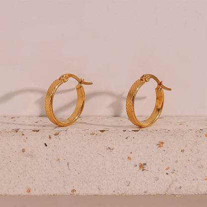 STUD 18K gold-plated slanted textured hoop earrings
