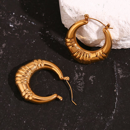 Close View of Vintage-inspired gold hoop earrings – 18K gold-plated triple-stripe, waterproof by STUD (Shop Till You Drop) 