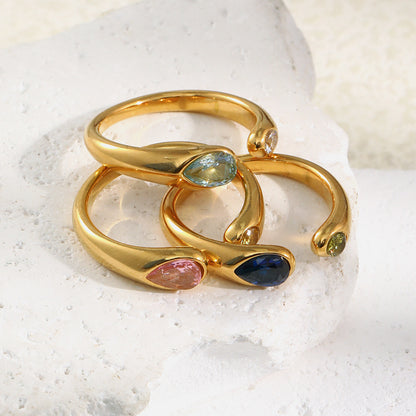 Close-up of serpent zircon ring with open band