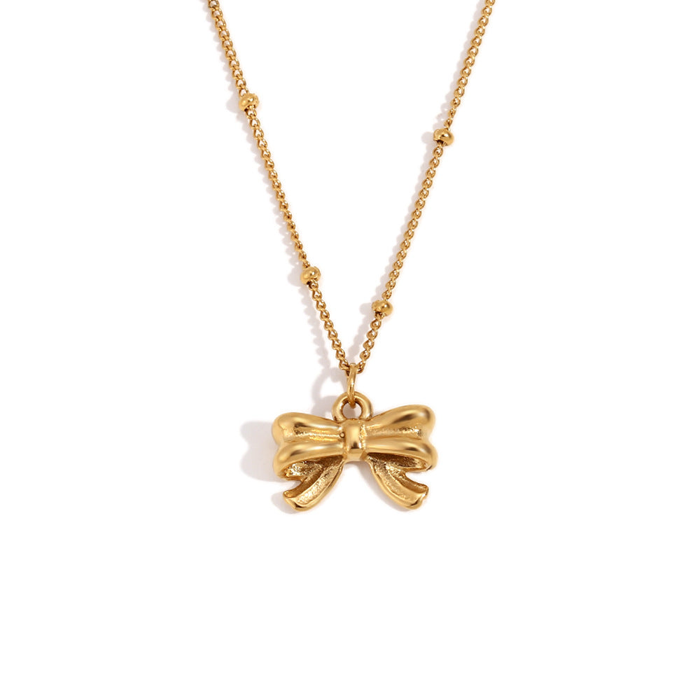 Gold bow pendant necklace - 18K gold plated, waterproof and hypoallergenic by STUD