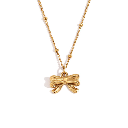 Gold bow pendant necklace - 18K gold plated, waterproof and hypoallergenic by STUD