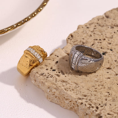 Gold Ring With A Diamond Set In The Center