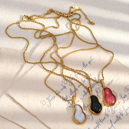 STUD Onyx Flow Necklace – Black Baroque Pendant on Gold Rope Chain