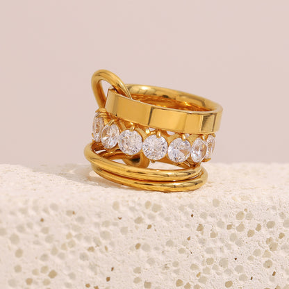 18K gold plated stacked ring set with high-shine bands and white zircon centerpiece – STUD
