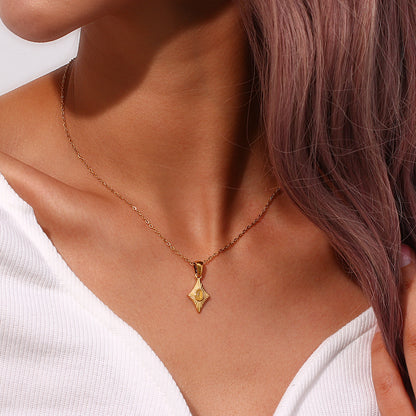 Cat eye-style stone pendant necklace in gold finish