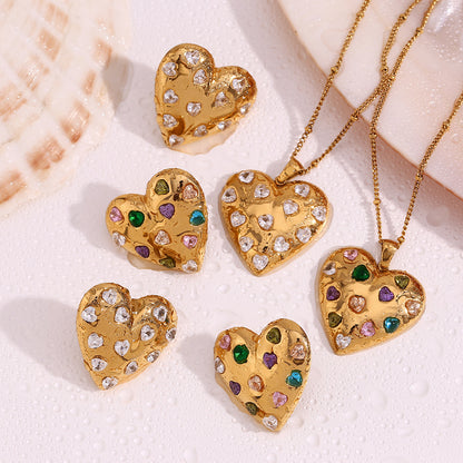 Gold heart earrings for romantic statement styling
