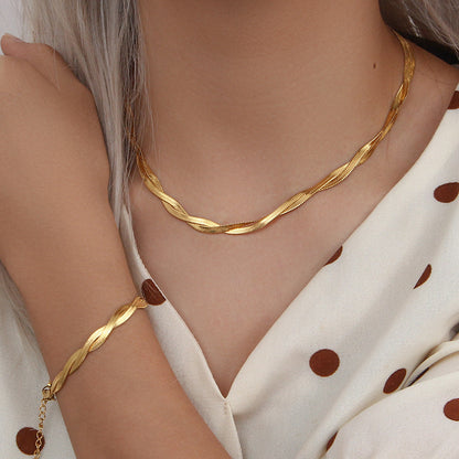 Close-up of twisted snake chain bracelet