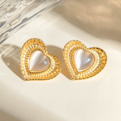 Heart-shaped gold earrings with white cat’s eye stone – 18K gold-plated, hypoallergenic by STUD (Shop Till You Drop)