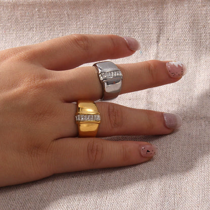 Gold Ring With A Diamond Set In The Center