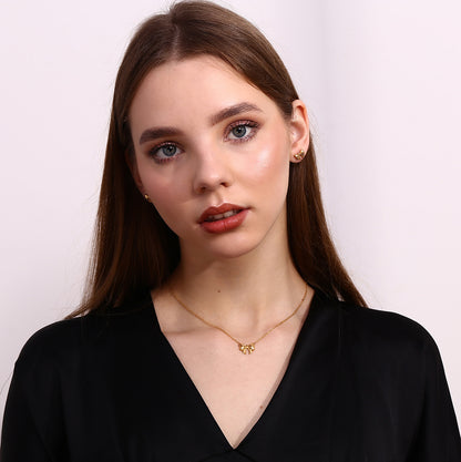 Silver bow stud earrings - Dainty 18K plated silver hypoallergenic earrings by STUD