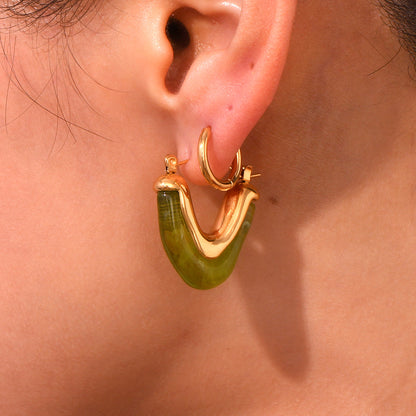Model Wearing Geometric triangle earrings with acrylic accent – 18K gold-plated, waterproof and hypoallergenic by STUD (Shop Till You Drop)