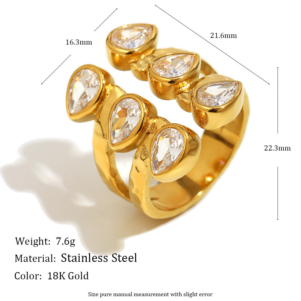 Bold 18K gold-plated open ring with double teardrop zircon stones on hammered stainless steel band – French statement design