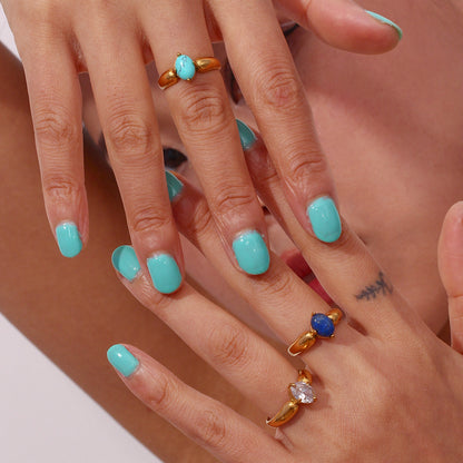 Gold petal shape ring with soft sculptural curve