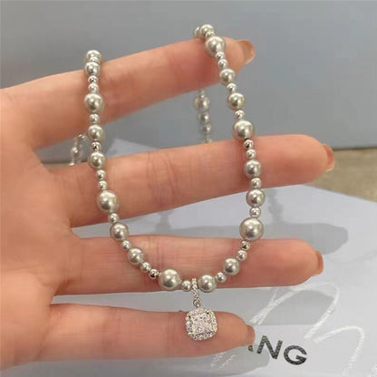 Close View of Silver pearl and diamond necklace – electroplated geometric design by STUD-Shop Till You Drop