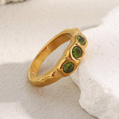 18K gold-plated chunky sculptural ring with three olive-green round cubic zirconia stones in raised square bezel settings, modern statement ring for women