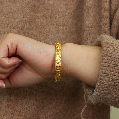 Celestial Star Moon Sun Bangle in gold-plated stainless steel by STUD