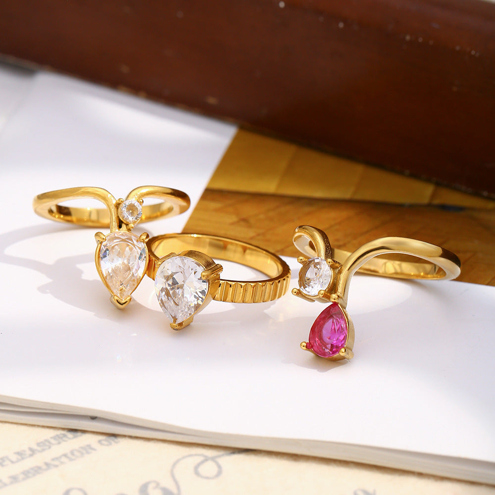 STUD 18K gold-plated stainless steel ring with crown-set pink and clear teardrop zircon stones