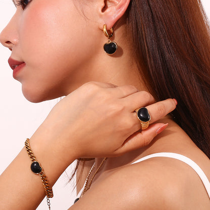 Gold and black heart ring