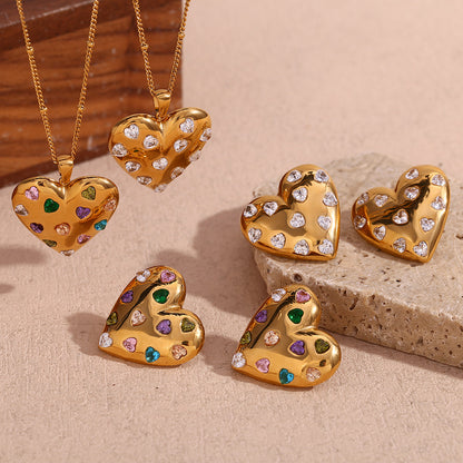 Detail view of zircon heart earrings by STUD