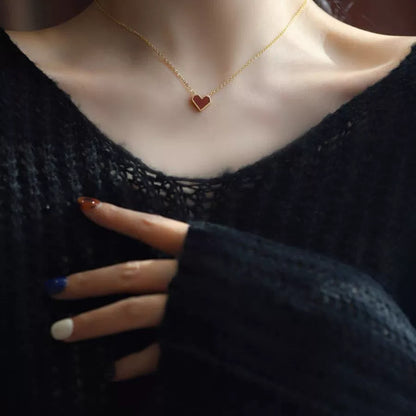 Model Wearing Red heart pendant necklace – French vintage design in gold plating by STUD-Shop Till You Drop