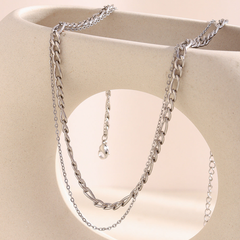 Silver stainless steel double layer chain necklace with chunky and delicate links.