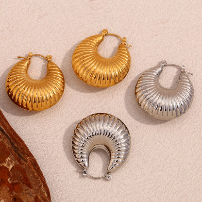 Top view of twisted ram’s horn earrings – 18K gold-plated, waterproof, anti-tarnish by STUD (Shop Till You Drop)