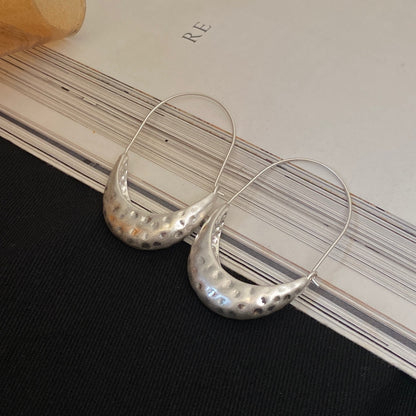 Detail view of Crescent Hoop Earrings by STUD