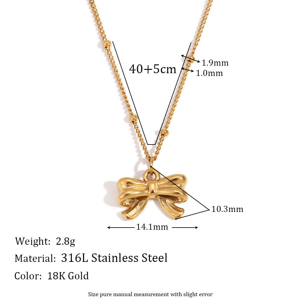 Gold bow pendant necklace - 18K gold plated, waterproof and hypoallergenic by STUD