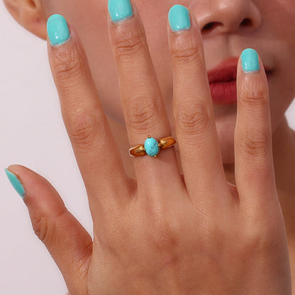 Detail view of 18K gold-plated petal ring by STUD