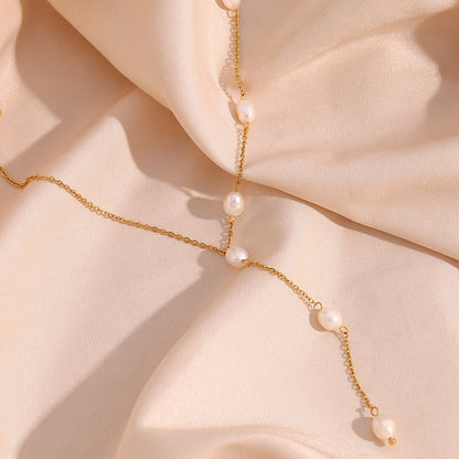 Close view of pearl Y-chain necklace