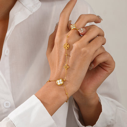 Close View of Elegant finger chain bracelet with white shell detail – hypoallergenic and waterproof – STUD