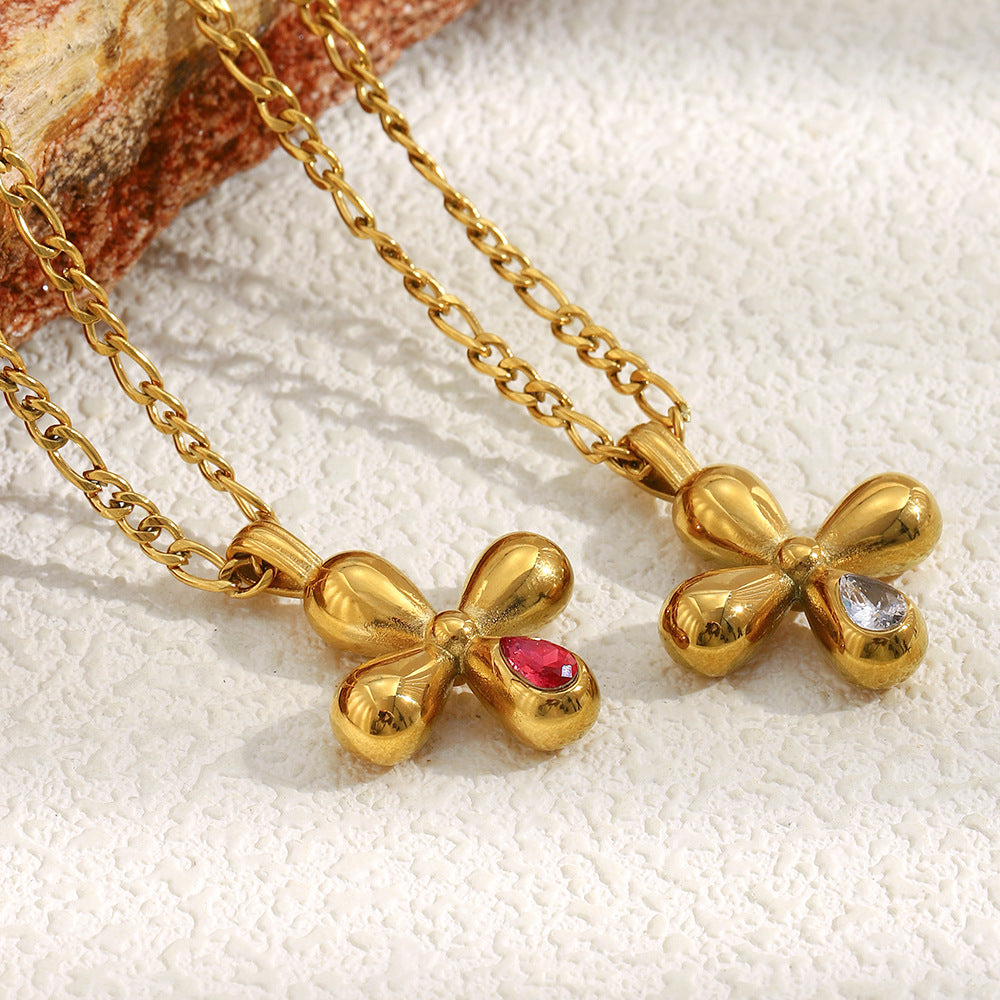 STUD Ruby Bloom Necklace – 18K gold-plated red zircon cross pendant