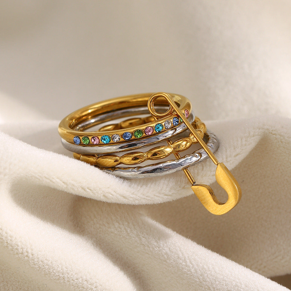 Bold sparkle safety pin ring with colorful stones and multi-layer design in 18K gold