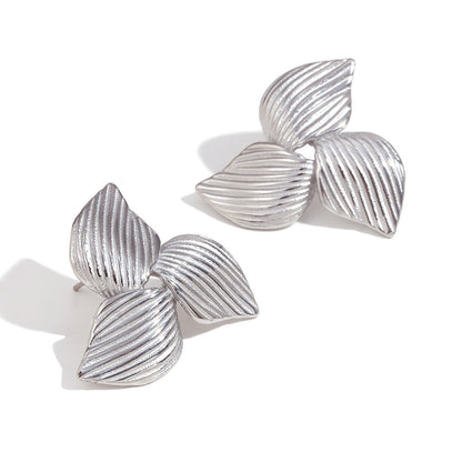 Close View of Silver boomerang-shaped earrings – polished stainless steel, waterproof and hypoallergenic by STUD (Shop Till You Drop)