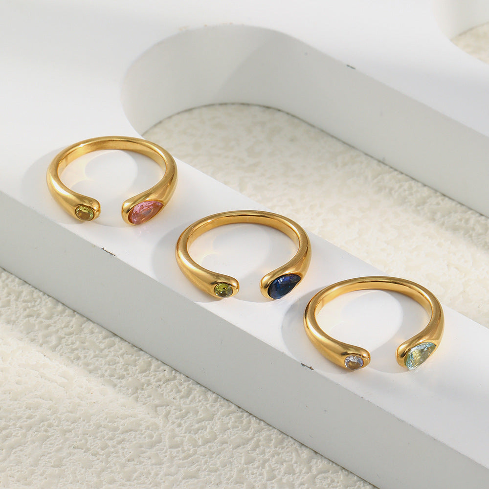 Gold snake-inspired ring with colourful zircon stones