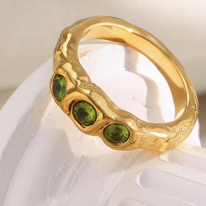 18K gold-plated chunky sculptural ring with three olive-green round cubic zirconia stones in raised square bezel settings, modern statement ring for women