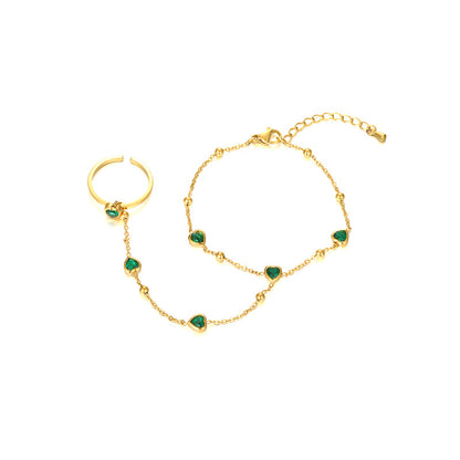 18K gold plated hand chain with green heart stones – ring to bracelet design – STUD