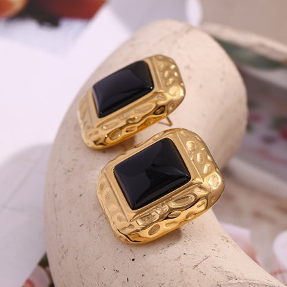 Side View of Hammered gold square earrings with black acrylic center – vintage office look by STUD (Shop Till You Drop)