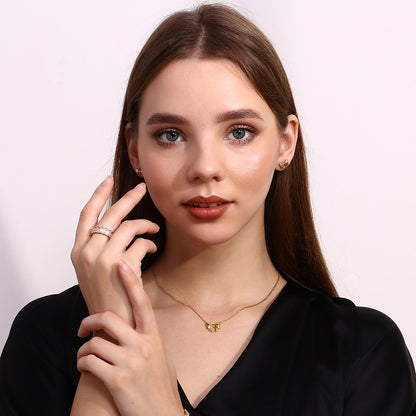 Gold bow stud earrings - 18K gold plated, skin safe and tarnish-free by STUD