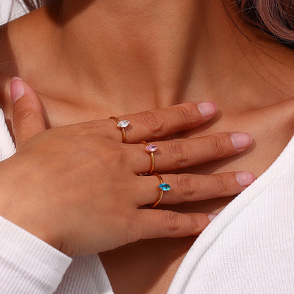 Model styling Minimalist marquise zircon adjustable ring – 18K gold-plated stainless steel open band with vibrant colored stones – by STUD (Shop Till You Drop)