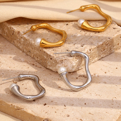 Top View of Minimalist pearl C-shaped silver and Gold hoop earrings – waterproof, hypoallergenic design by STUD (Shop Till You Drop)