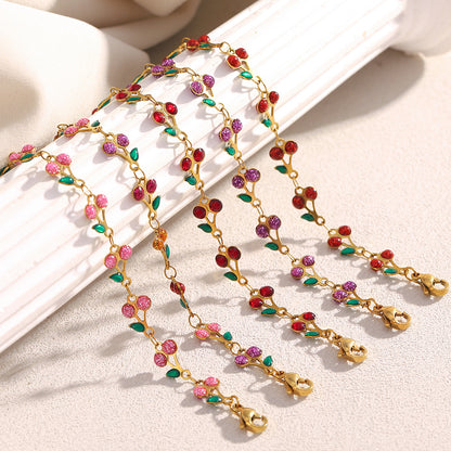 Colorful cherry enamel bracelet with 18K gold finish and leaf details