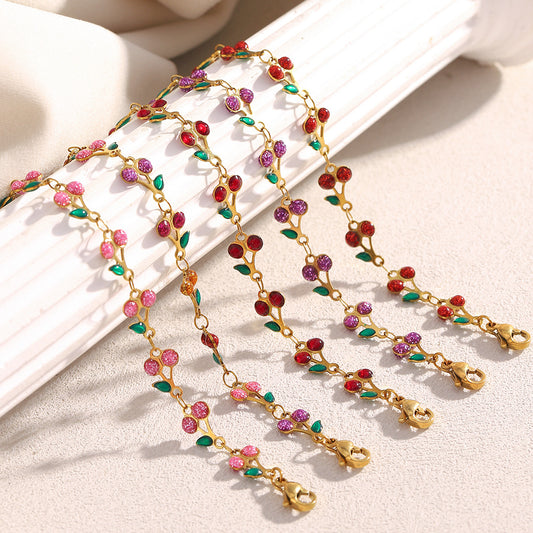 Colorful cherry enamel bracelet with 18K gold finish and leaf details