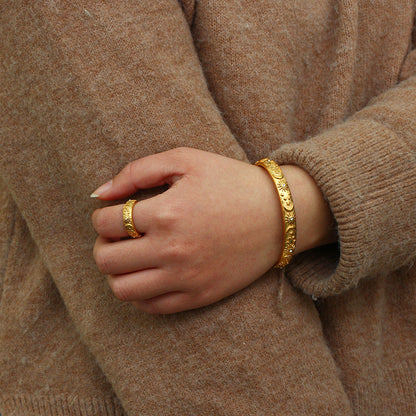 Detail view of Celestial Star Moon Sun Bangle by STUD