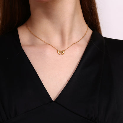 Gold bow pendant necklace - 18K gold plated, waterproof and hypoallergenic by STUD