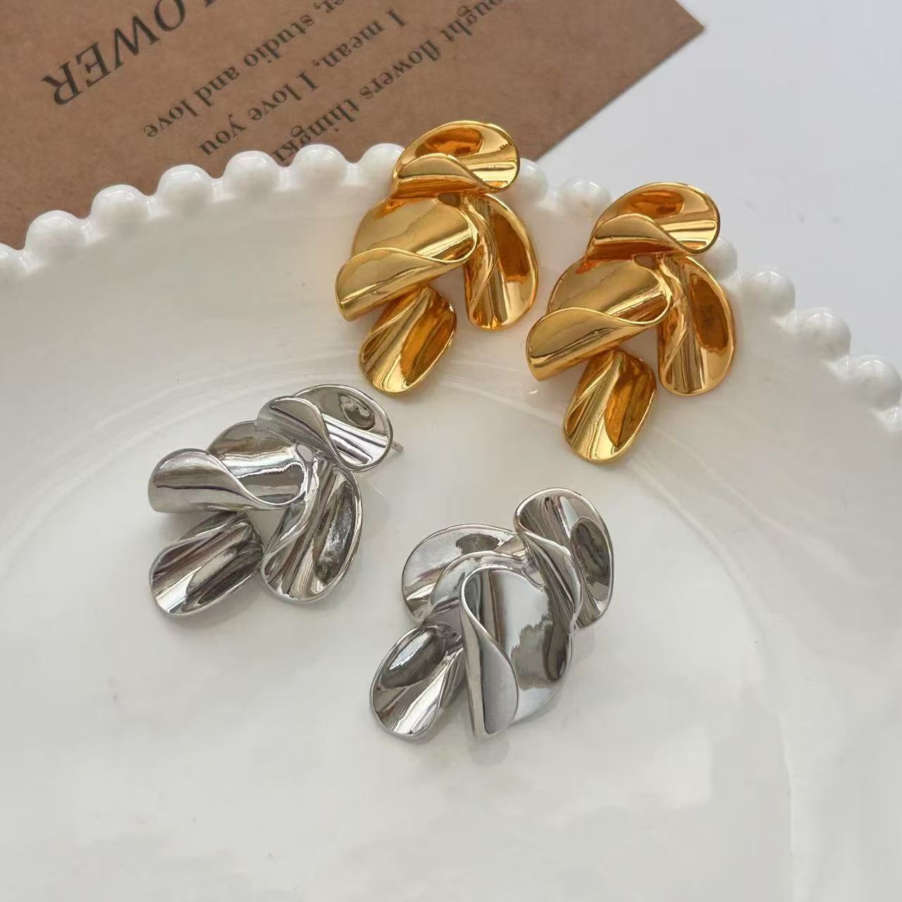 Detail view of Twisted Leaf Stud Earrings