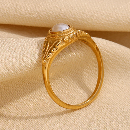 Delicate, feminine, and timeless — this Gold Plated Pearl Flower Ring is designed to elevate any look with understated charm. Featuring a dainty floral motif paired with fine pearls, it captures the essence of modern minimalism and vintage elegance. Made from stainless steel and finished in radiant gold plating, it's waterproof and anti-tarnish — perfect for daily wear without compromising shine or style.