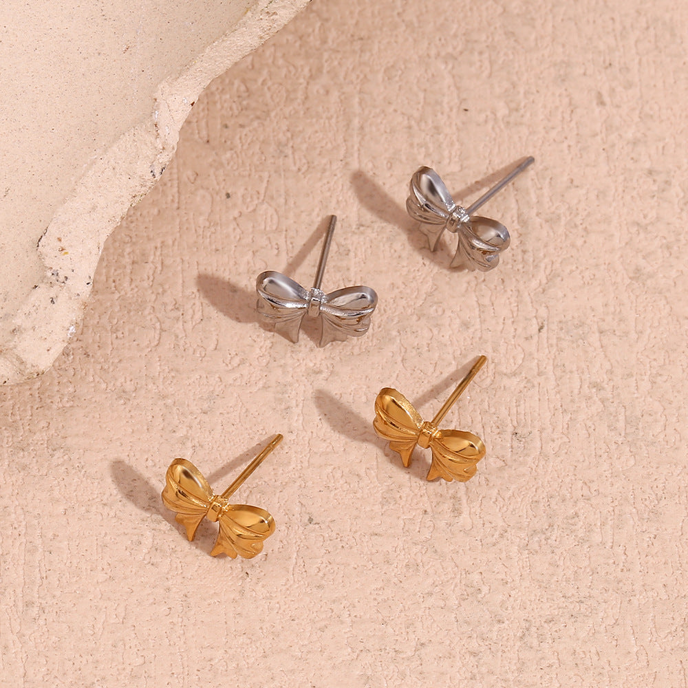 Silver bow stud earrings - Dainty 18K plated silver hypoallergenic earrings by STUD